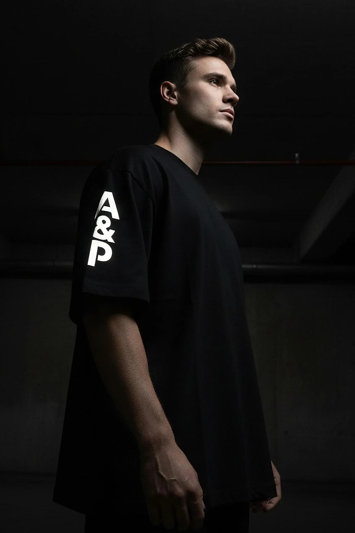 Oversize Reflective Logo Black Cotton Tee Back View A&P Graphic
