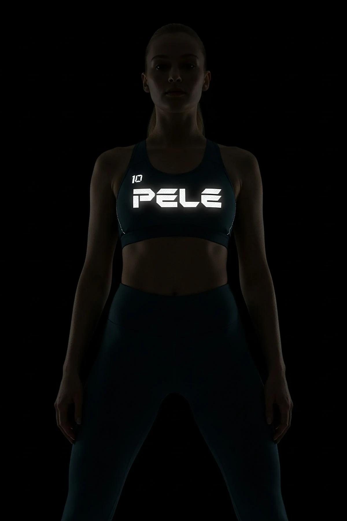 Reflective grey fitness outfit with glowing logo