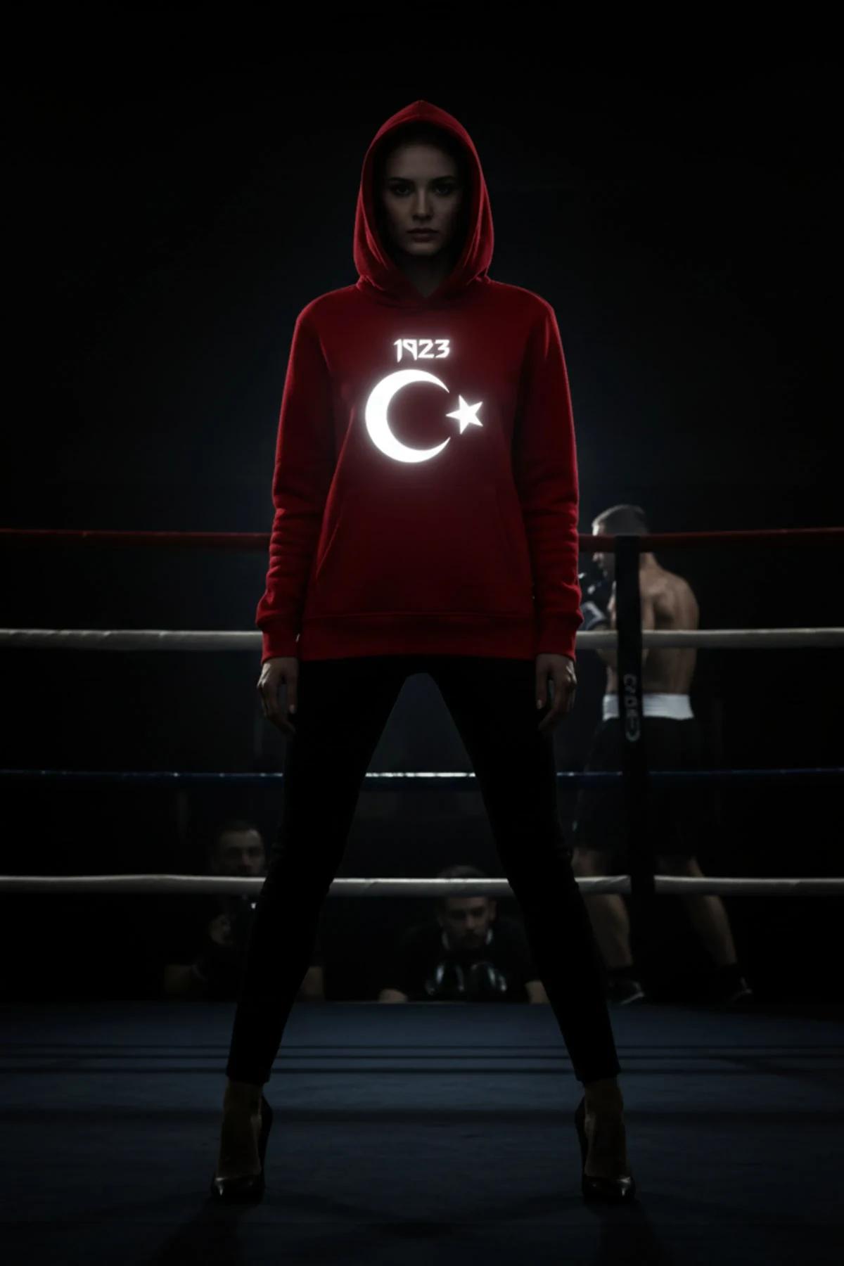 Festival red hooded sweatshirt with white crescent moon and star graphic