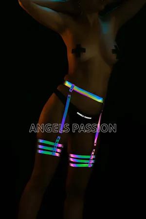 Holographic reflective waist and thigh harness set on model