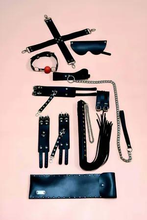 Black Faux Leather 7-Piece Accessory and Restraint Set with Cuffs and Paddle