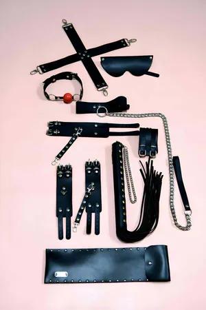 Black Faux Leather 7-Piece Accessory and Restraint Set with Cuffs and Paddle