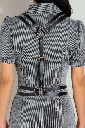 Black faux leather body harness with gold O-ring and adjustable buckle strap