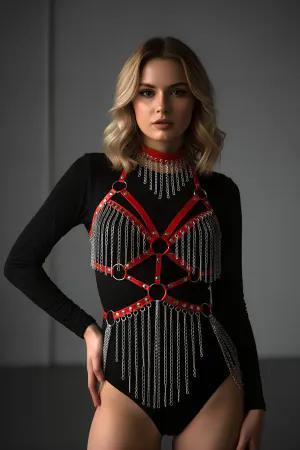 Red faux leather body harness with cascading silver chains and O-rings.