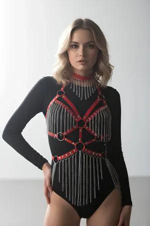 Red faux leather body harness with cascading silver chains and O-rings.