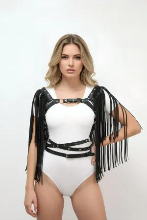 Black faux leather body harness with adjustable straps and dramatic swinging fringe.