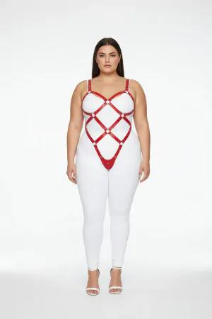 Red vegan leather full body harness with diamond strap pattern and O-ring details