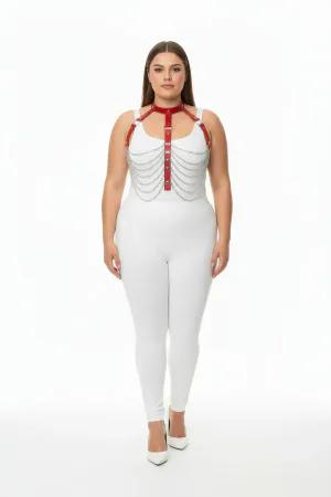 Red faux leather body harness with cascading silver chains, worn by a model.