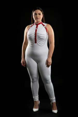 Red faux leather body harness with cascading silver chains, worn by a model.