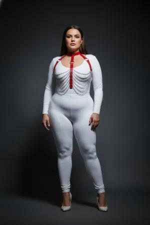 Red faux leather body harness with cascading silver chains, worn by a model.