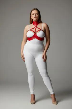 Red faux leather collar and chest harness set worn by a plus-size model.