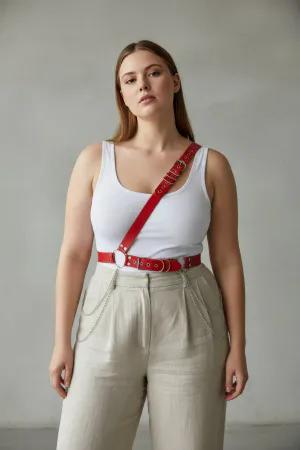 Red Faux Leather Single Shoulder Body Harness with Studs Worn by Plus-Size Woman