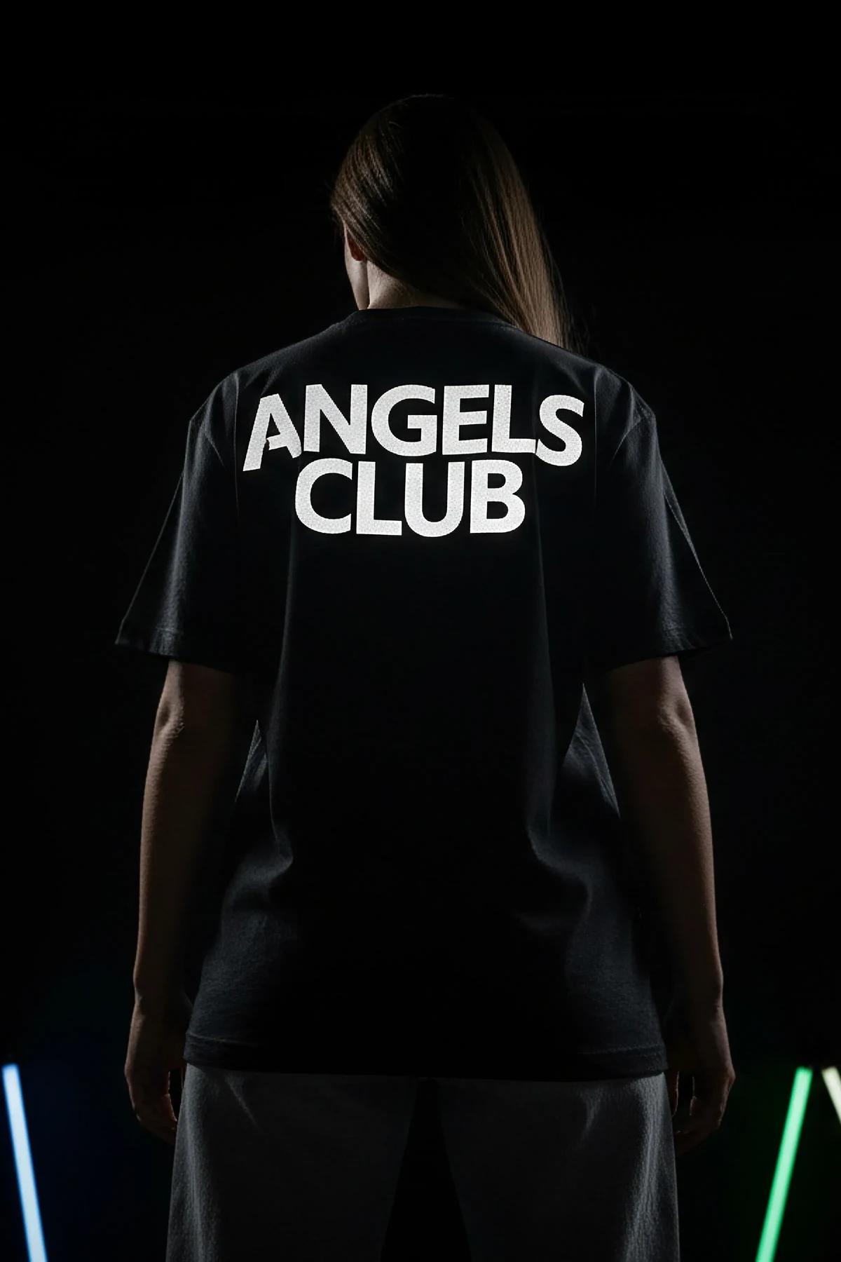 back view black heavyweight oversized t-shirt clean matte fabric wide dropped-shoulder silhouette