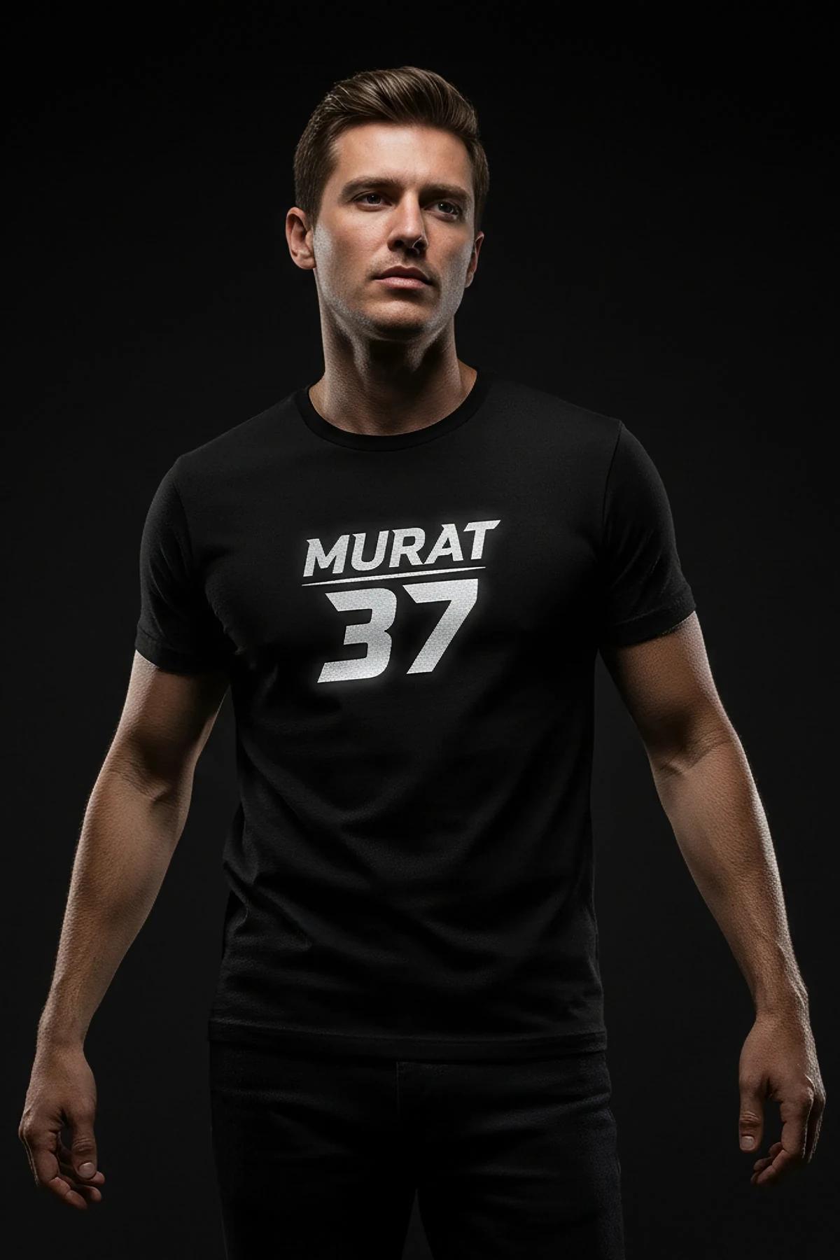 oversized black graphic tee styled with cargo trousers streetwear outfit flat lay