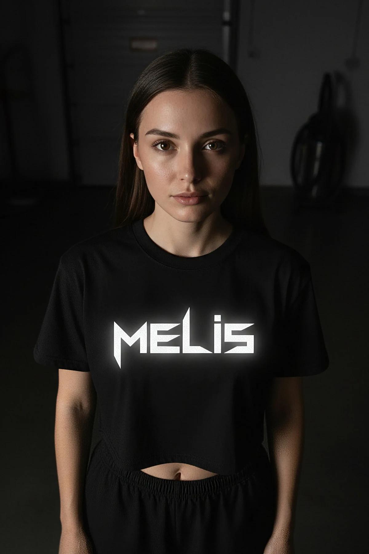 Black short-sleeve crop top with reflective logo, non-harness apparel item