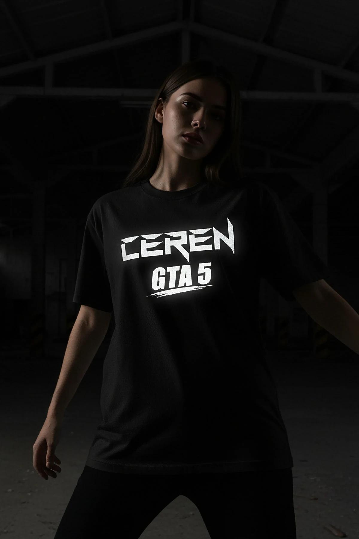 oversized black streetwear tee with angular glow graphic, front detail under UV light