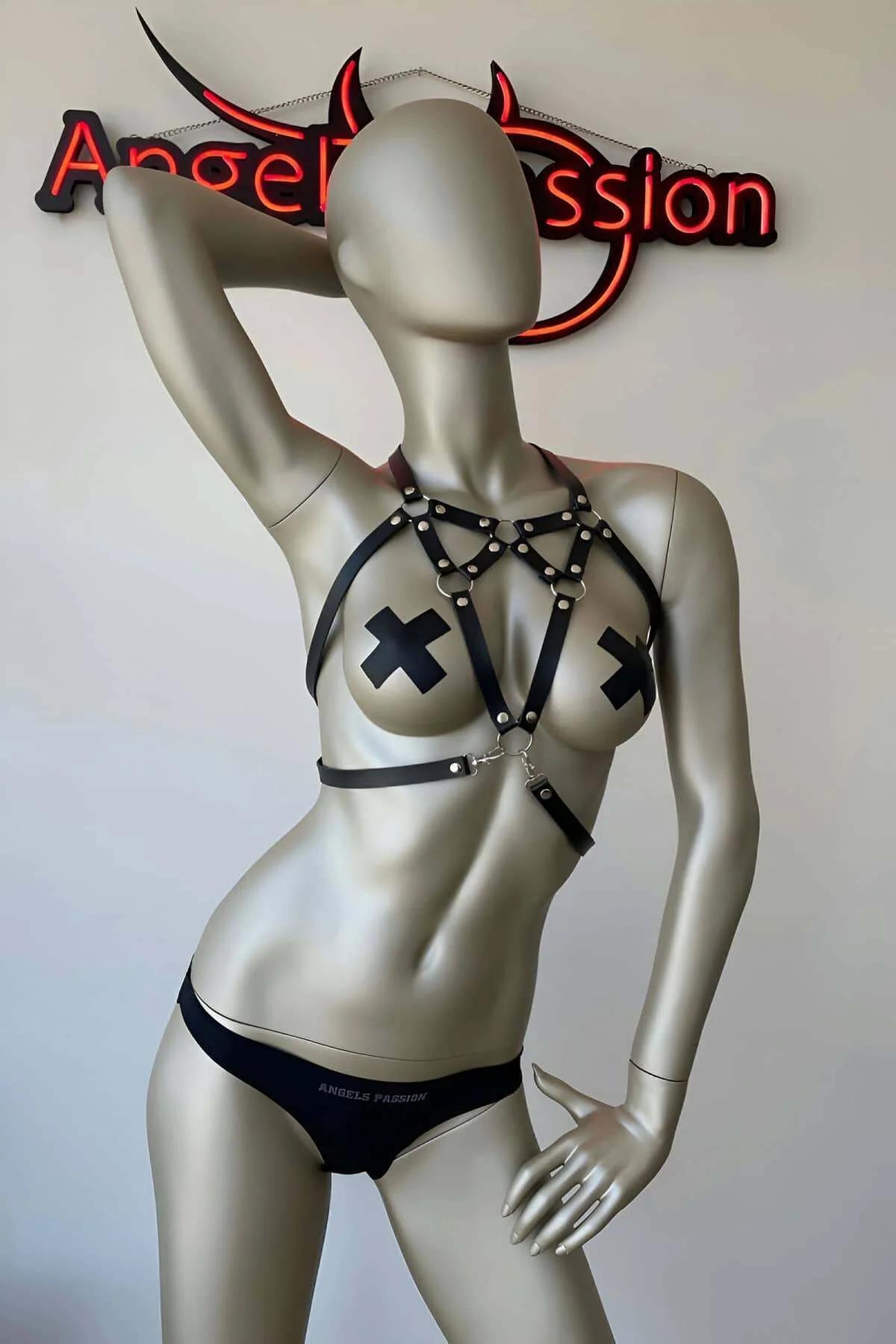 front view of black PU leather chest harness showing two silver O-rings at center