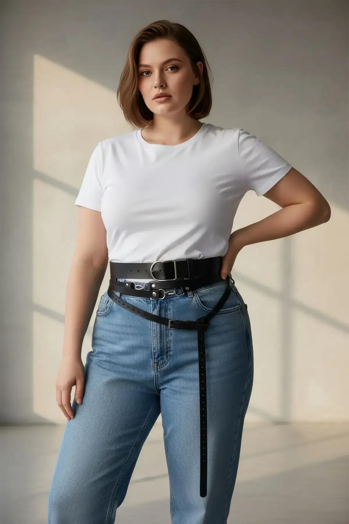 Close-up of silver-tone pin buckle details on black PU multi-strap waist harness belt