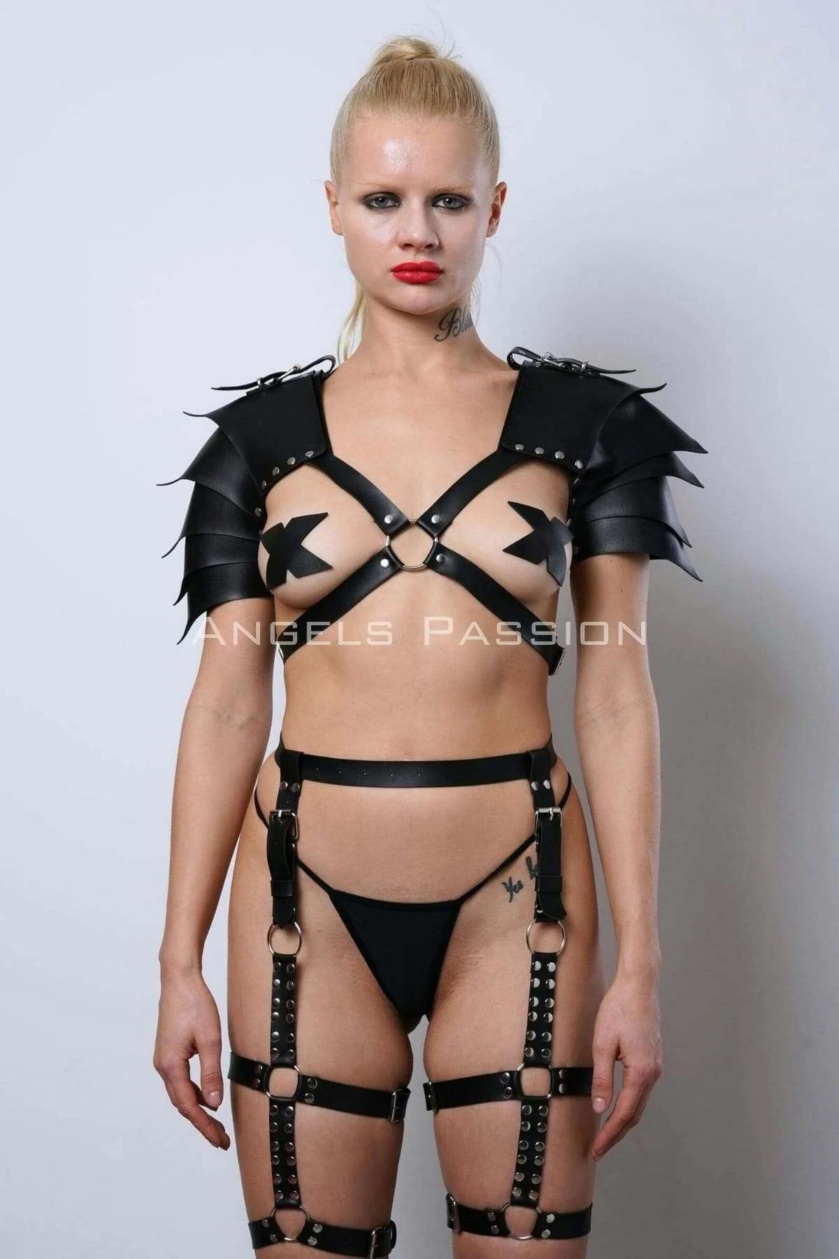 Full-length view of complete black gladiator harness set showing shoulder armor, chest straps, waist band, and thigh cuff gar