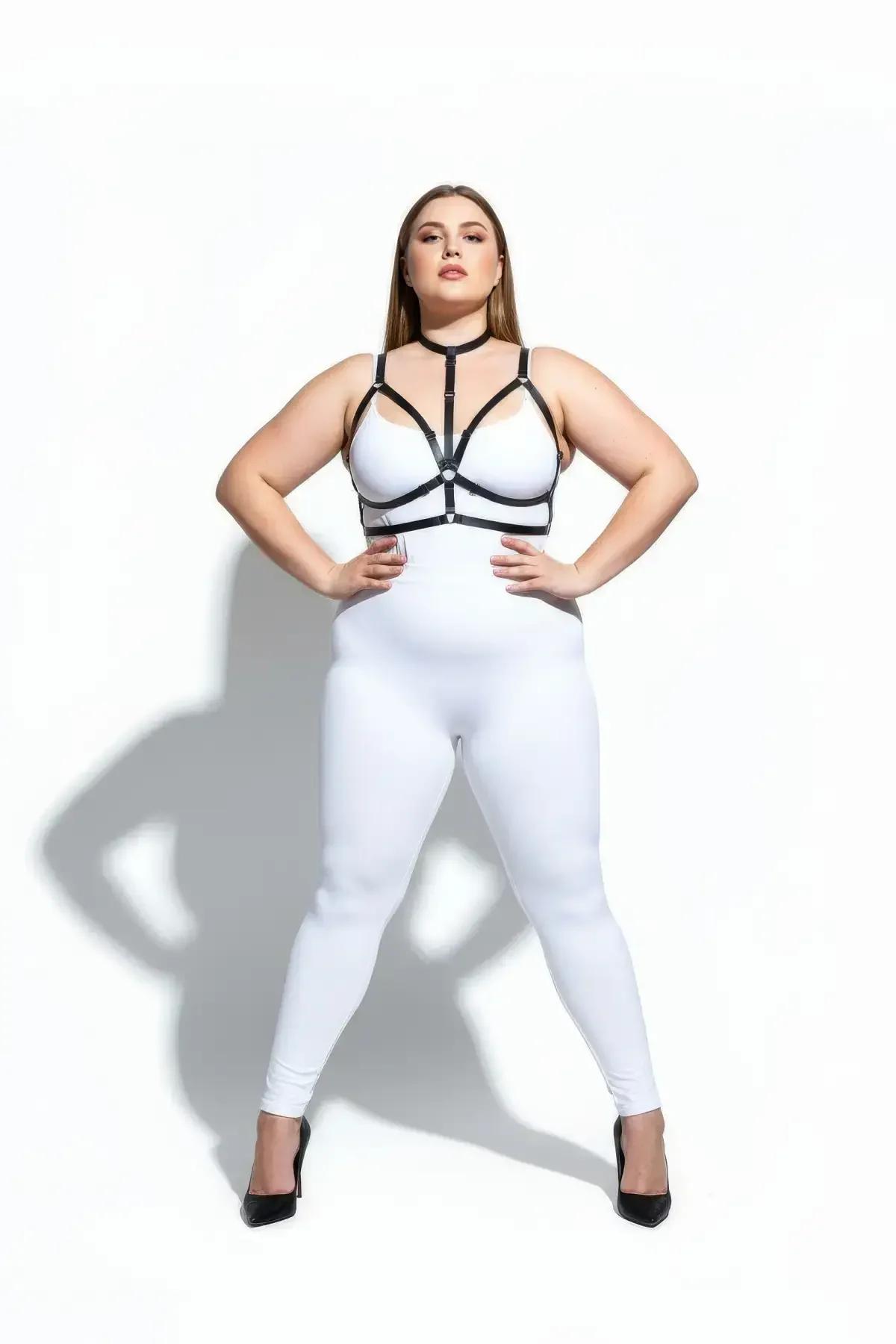 Black vegan leather chest harness front view showing triangular V-strap frame and collar detail