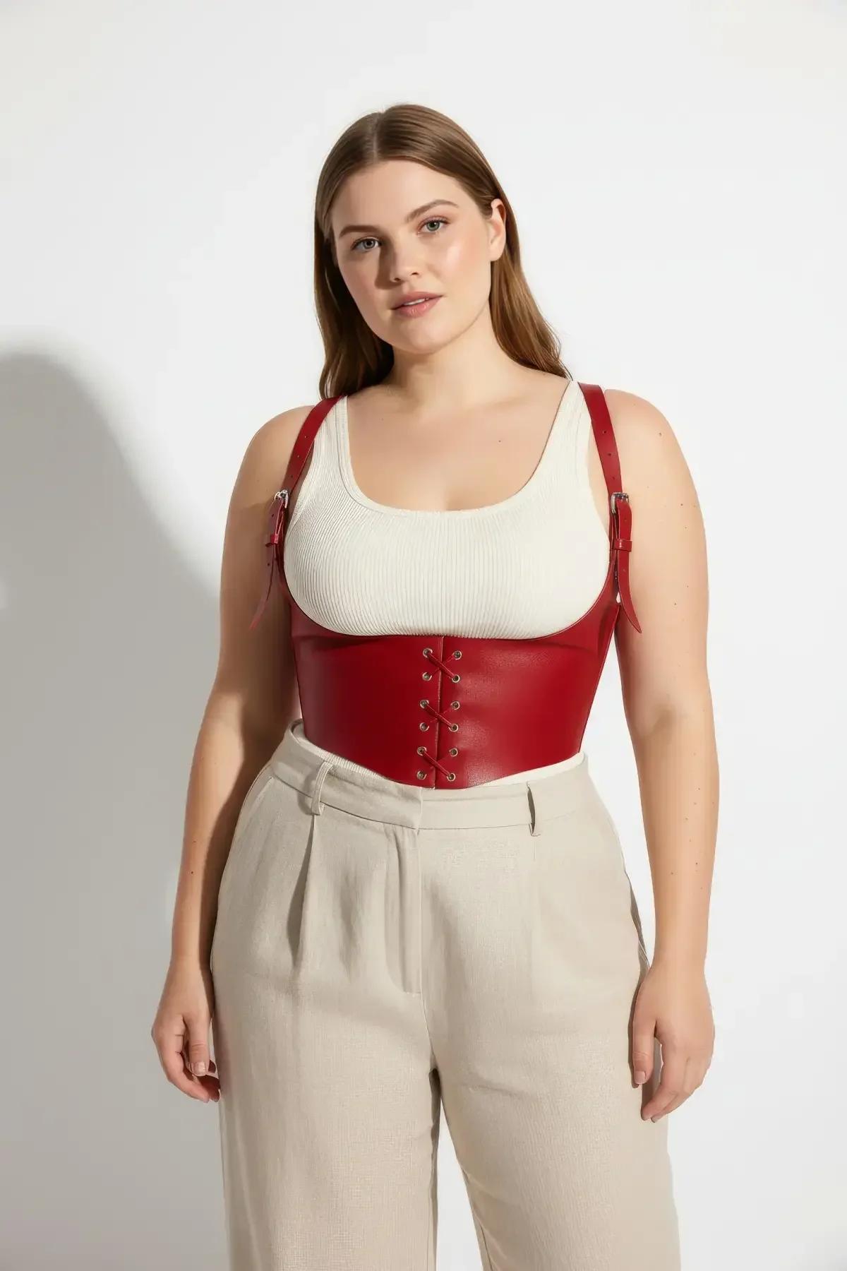 Back view of red underbust corset harness showing adjustable shoulder strap length and PU panel construction
