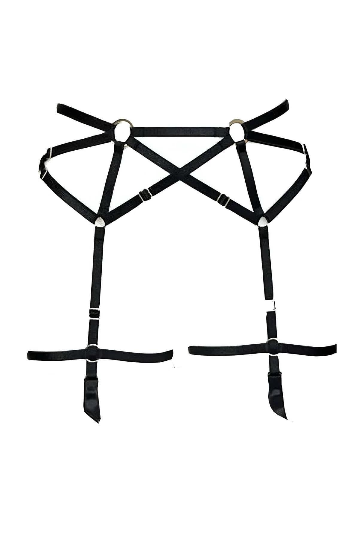 Detail of adjustable slider on black elastic body harness strap with silver-tone hardware