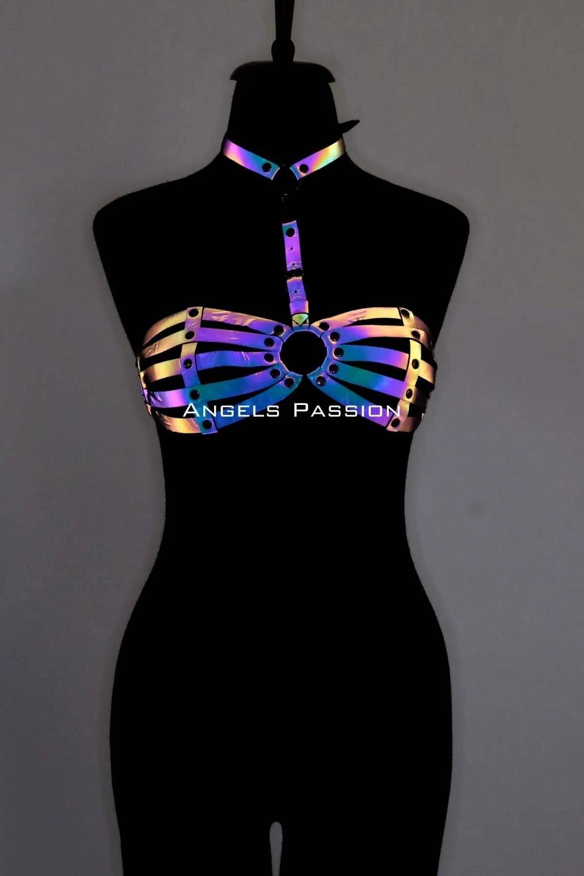 Front view of iridescent holographic chest harness showing five horizontal cage bands and central metal O-ring