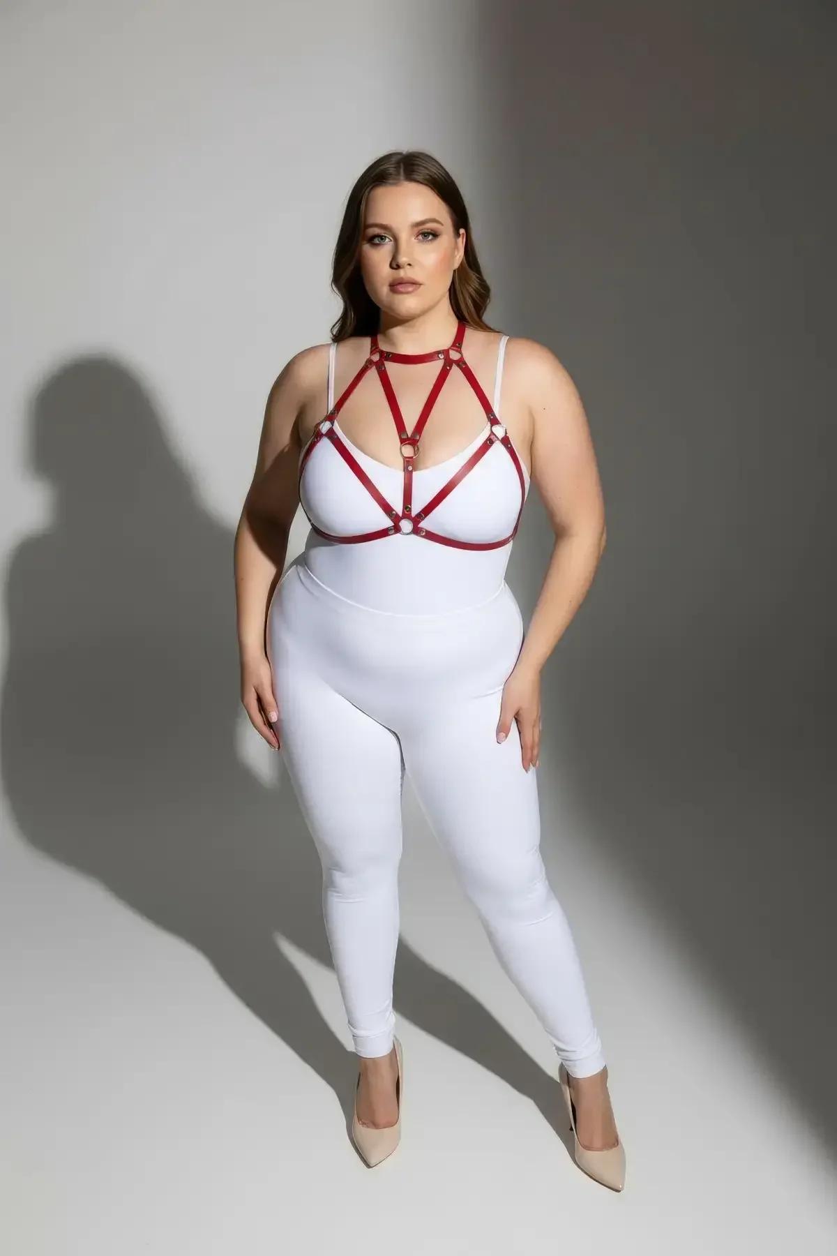 plus size red body harness worn over white outfit showing full geometric cage strap layout