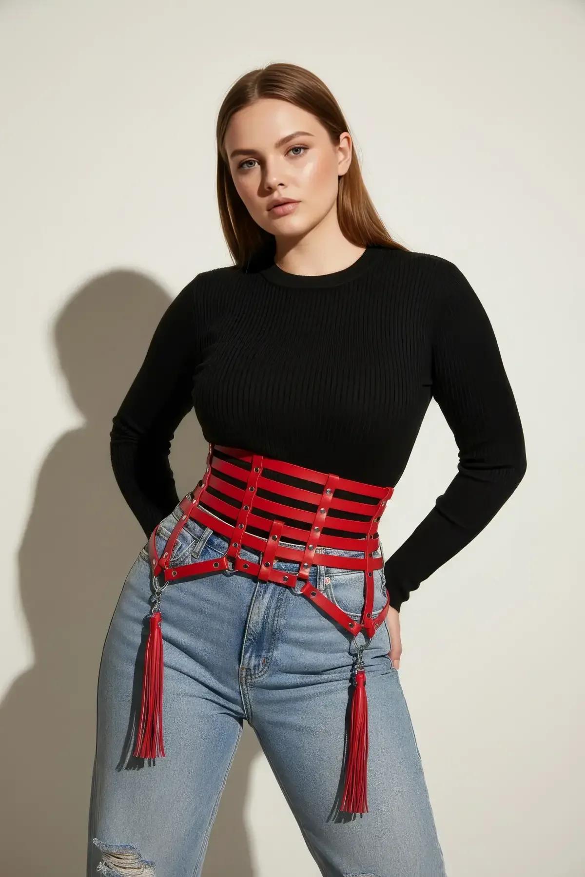 Red cage waist harness laid flat showing five adjustable straps and fringe tassel attachments