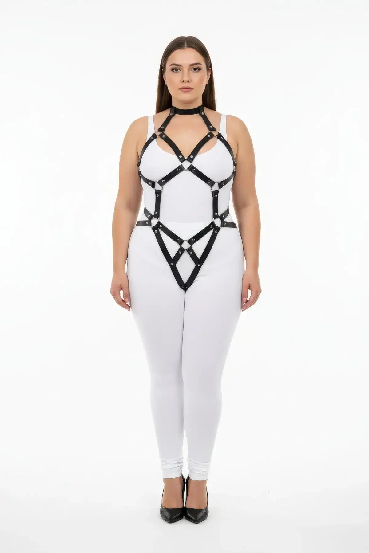 front detail of black vegan leather o-ring body harness showing silver eyelet rivets and chest cage structure