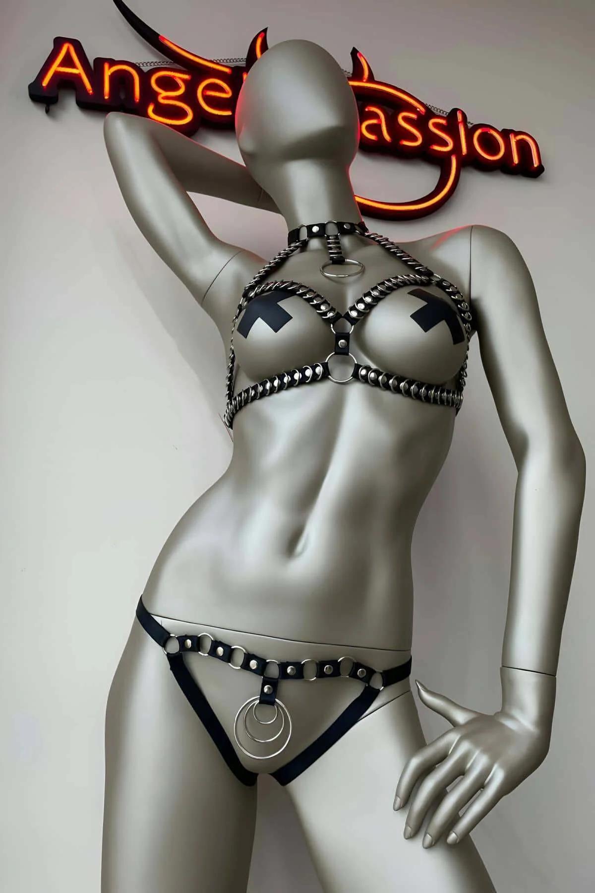 close-up silver O-ring 3cm center front on black faux leather body harness