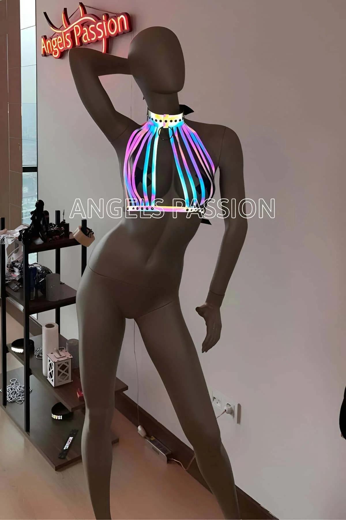Rear view of rainbow harness choker snap closure against bare back