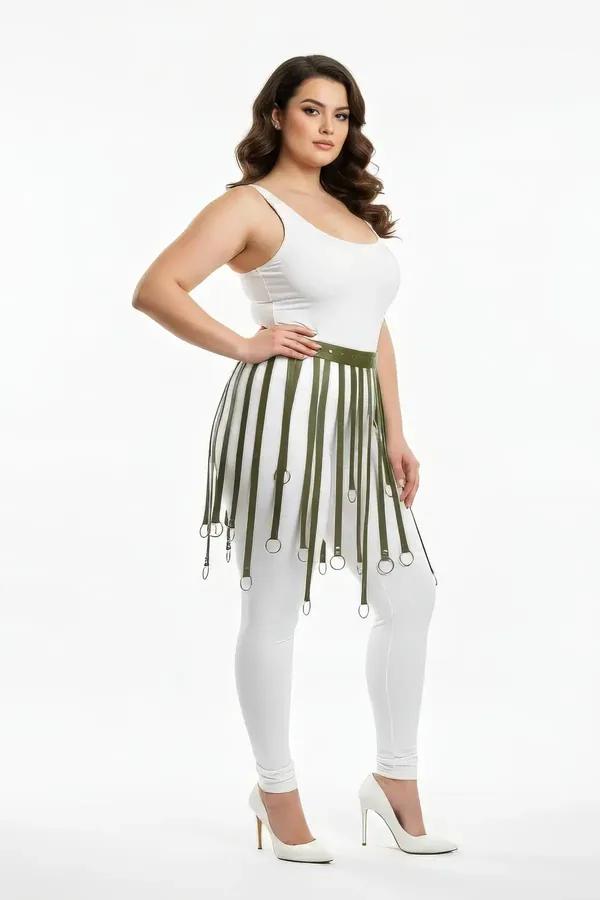 Olive green faux leather fringe waist harness with silver O-ring tipped straps worn over white leggings