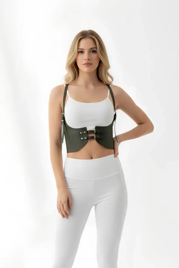 Olive green faux leather underbust harness waist cincher with double silver buckles and adjustable shoulder straps worn over 