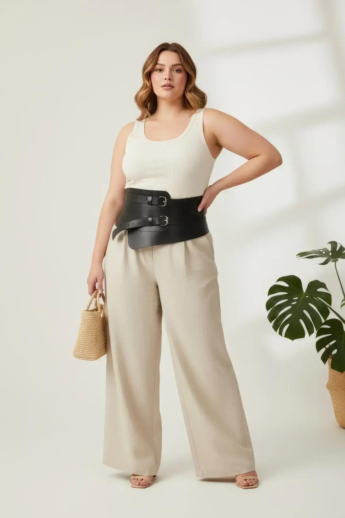 wide black PU waspie belt showing asymmetric front panel detail and two silver rectangular buckles