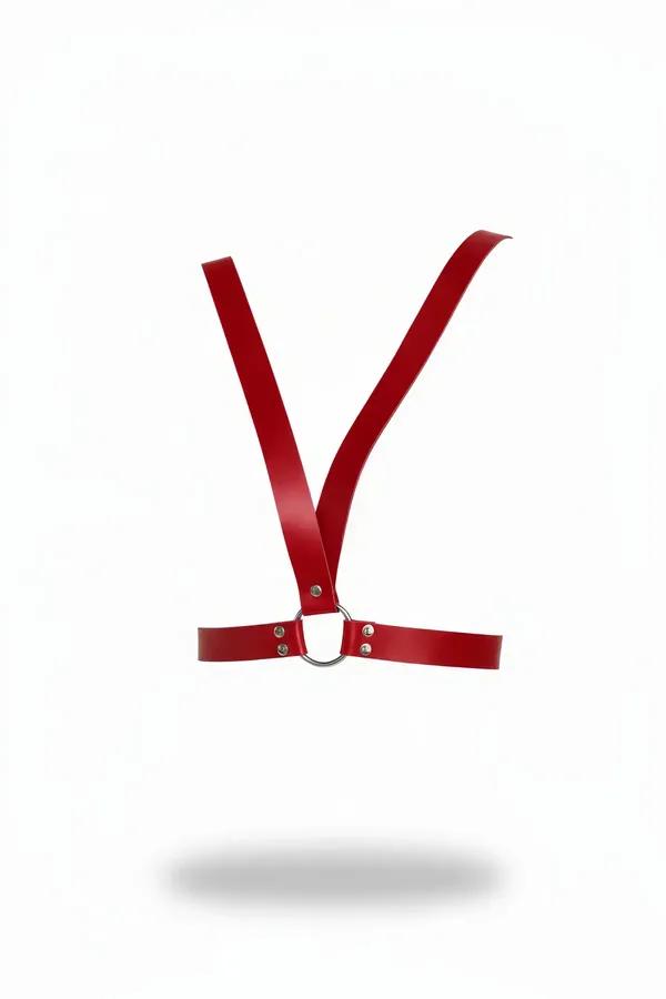 Red faux leather chest harness with Y-strap design and silver O-ring, smooth matte finish on white background