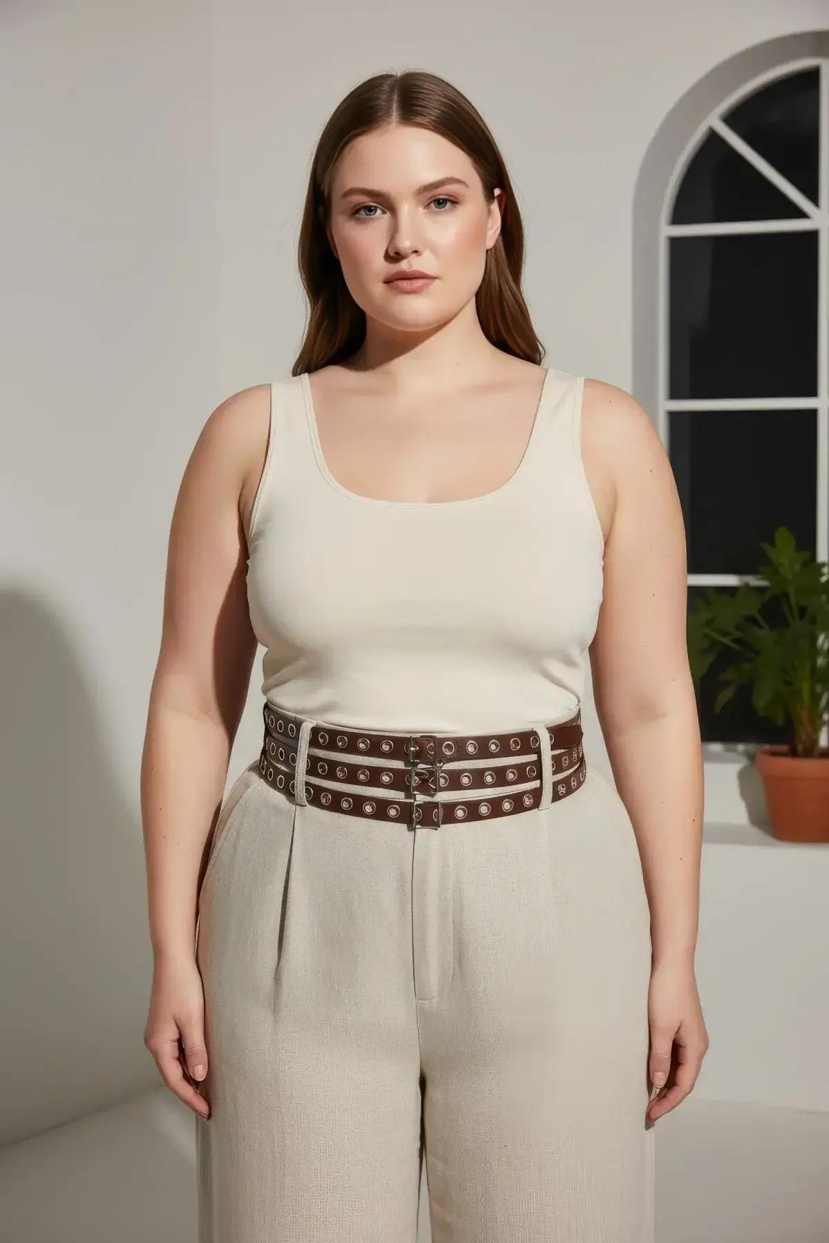 flat lay of dark brown three-strap waist harness belt showing eyelet spacing and strap width detail