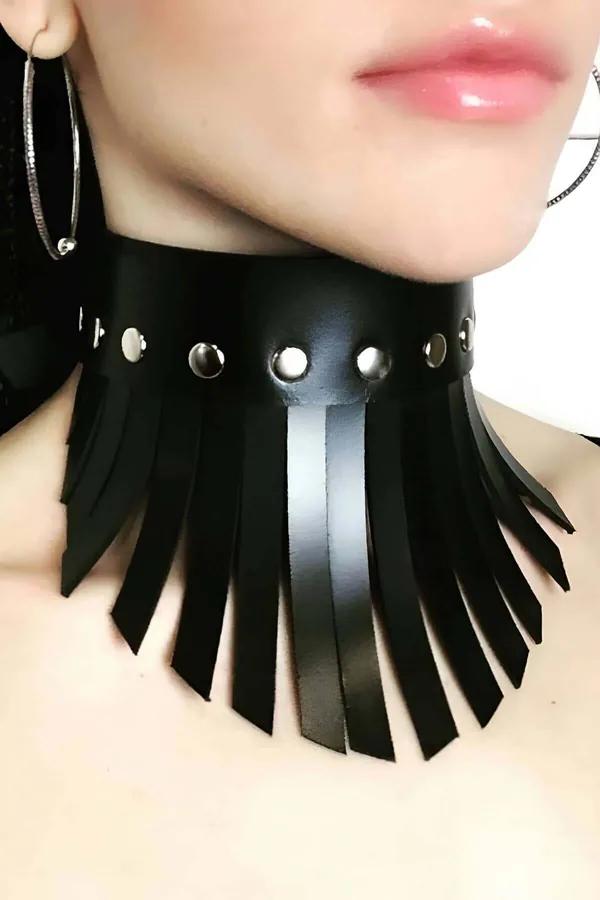 black faux leather wide-band fringe collar choker with silver dome rivets along top edge worn on neck