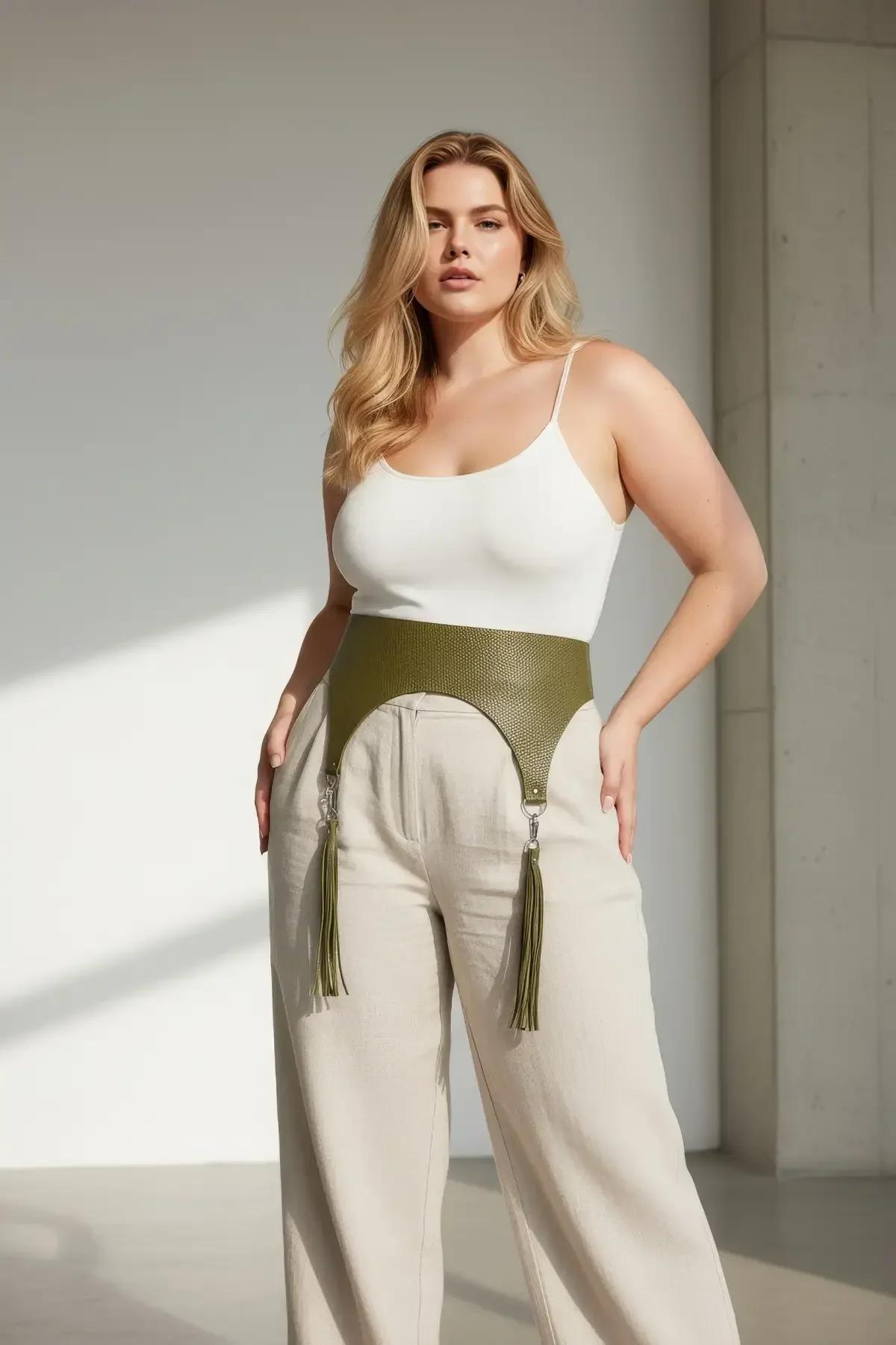 Olive ribbed knit underbust harness with silver O-ring tassel garters close-up detail