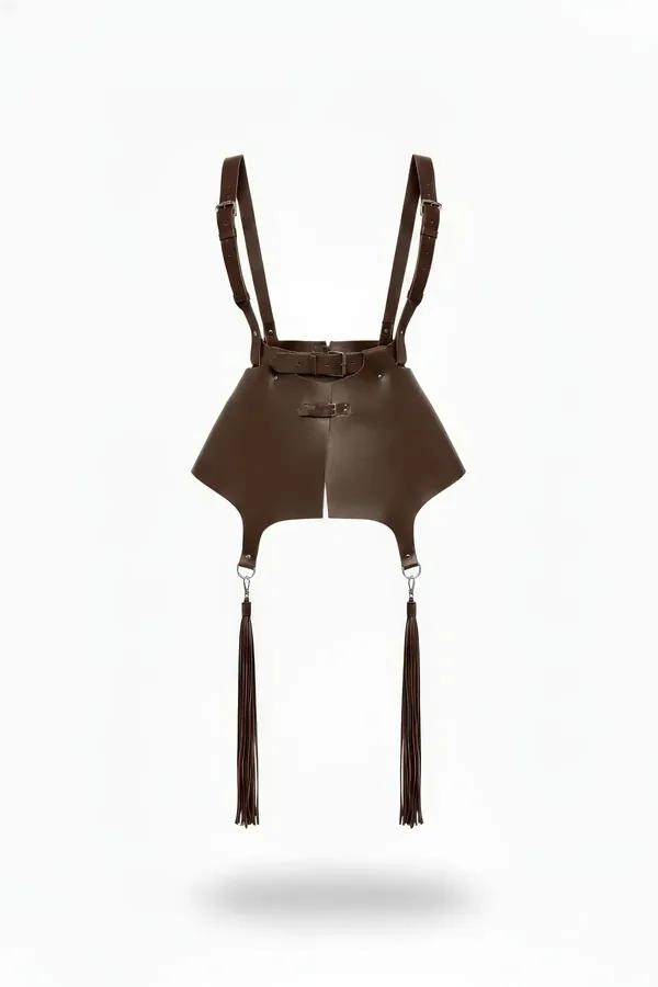 Chocolate brown faux leather waist harness with adjustable suspender straps, silver hardware buckles, and four long fringe ta