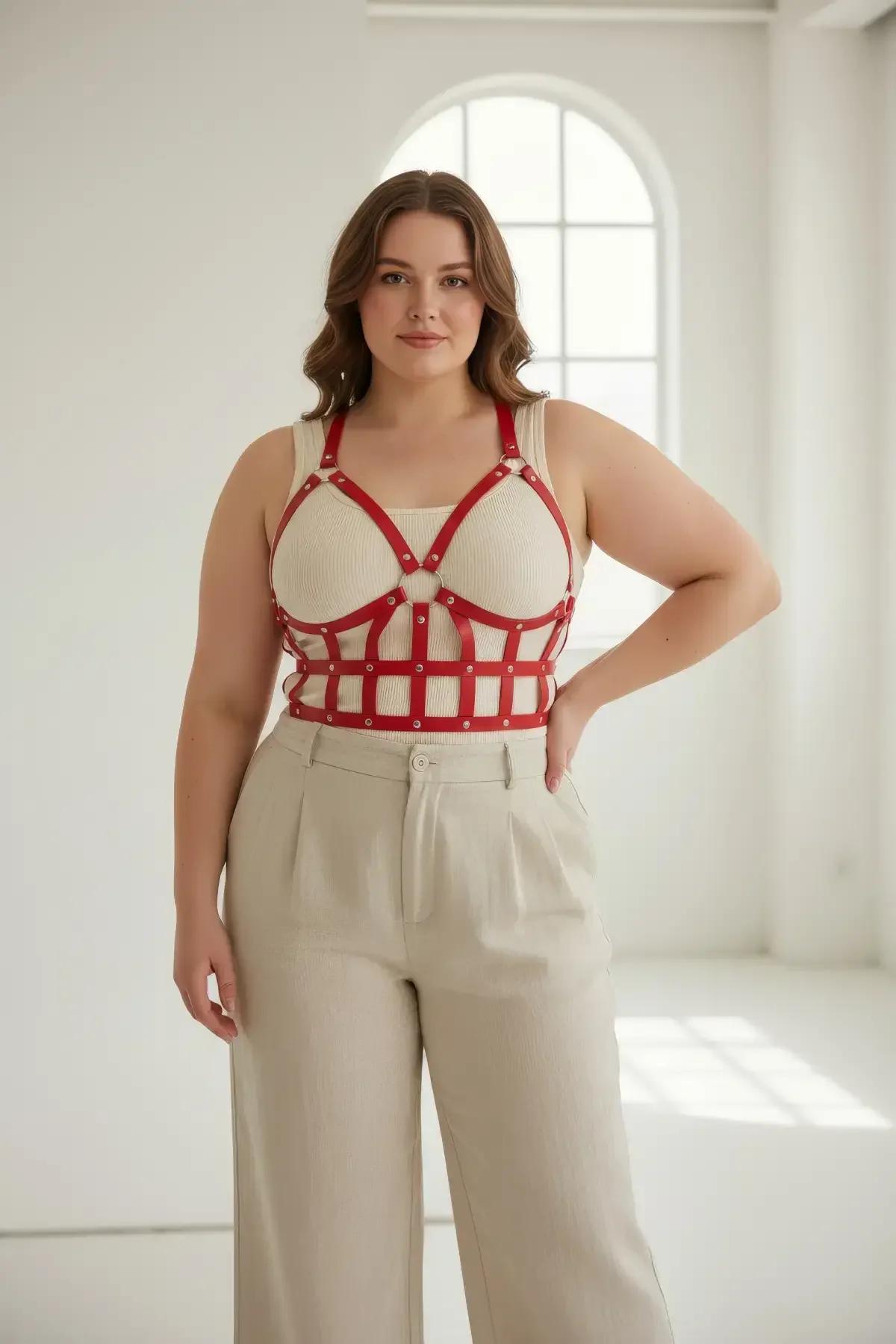 Red faux leather bustier harness with adjustable shoulder straps and back buckle closure