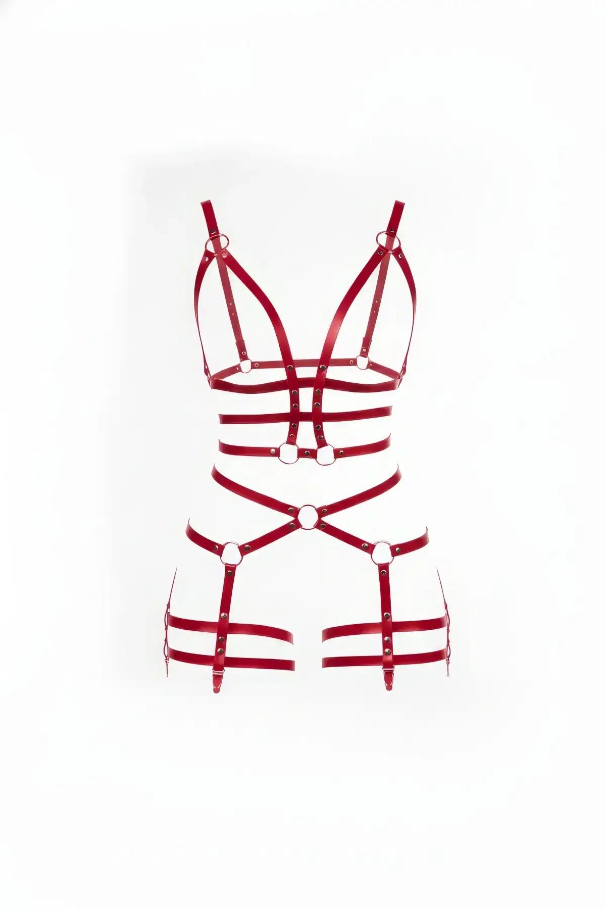 Red faux leather strappy body harness with silver O-rings, layered waist bands, X-cross hip straps, and double leg bands, fro