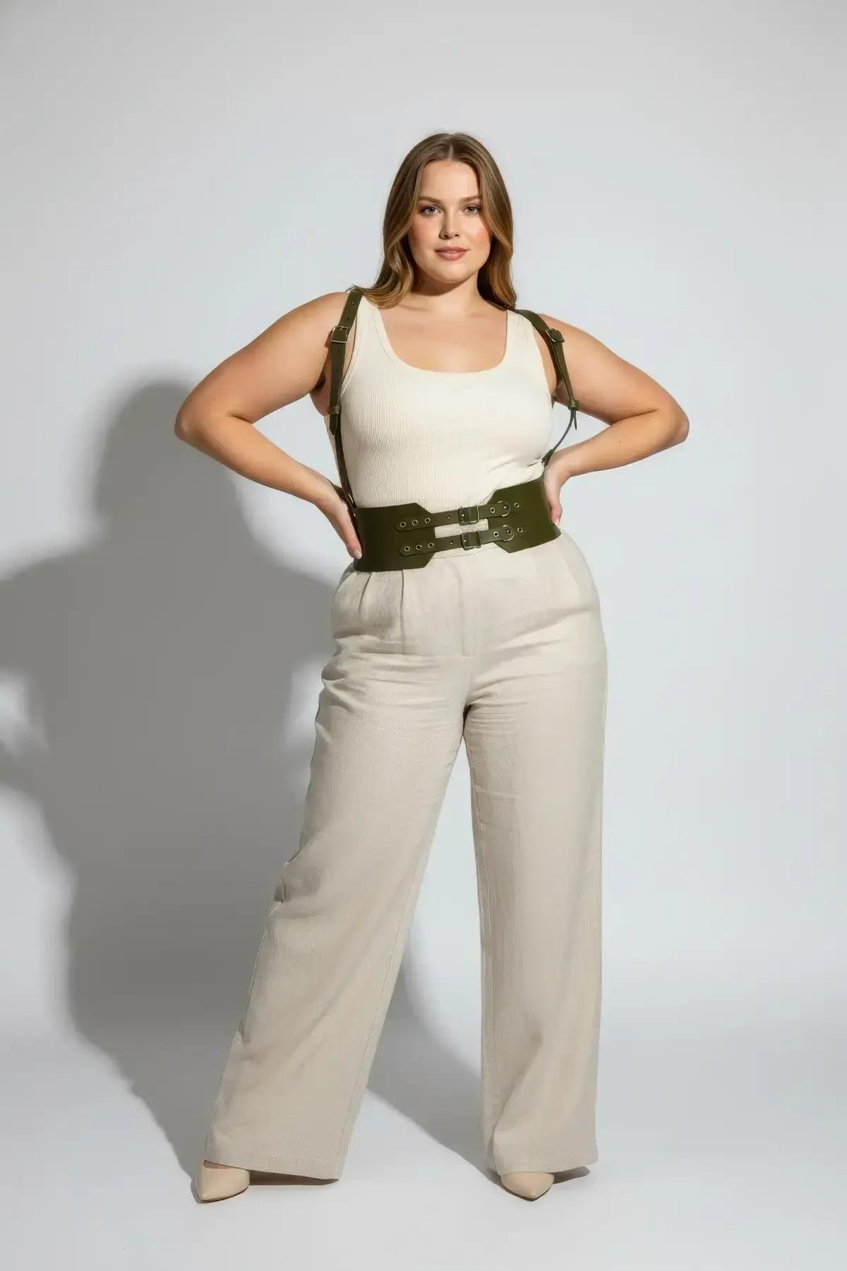 adjustable shoulder straps of olive green waist harness with silver-tone buckle closure detail