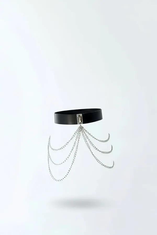 Black faux leather waist harness with five rows of cascading silver-tone draped chains and rectangular buckle clasp