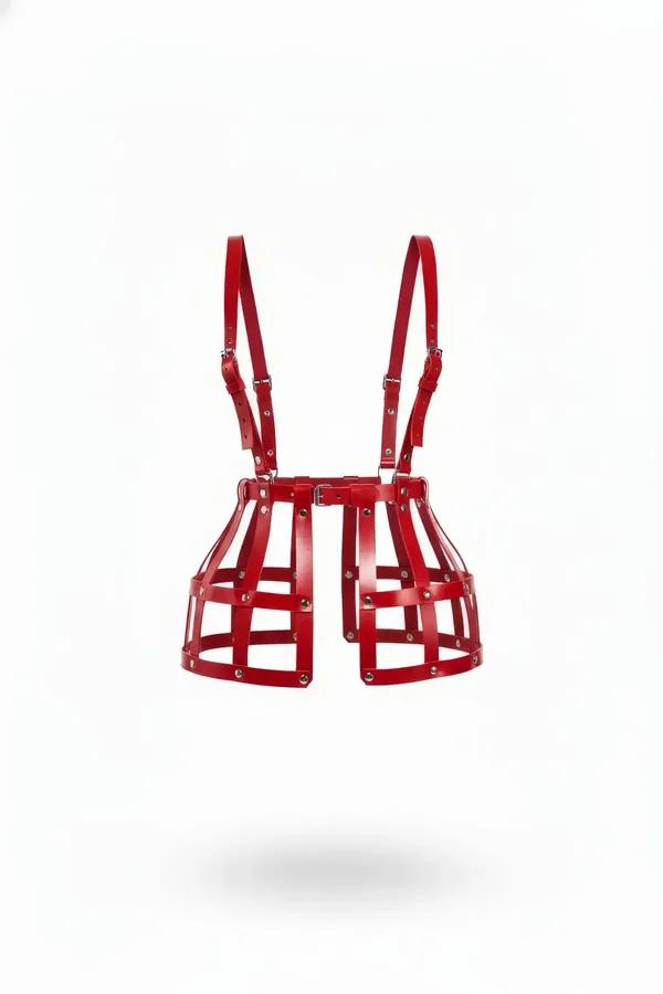 red faux leather caged waist harness skirt with silver rivets and adjustable suspender straps on white background