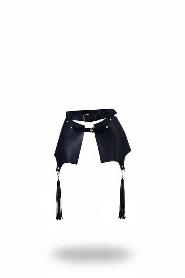 Black faux leather waist harness with structured skirt panels and fringe tassels, silver buckle closure