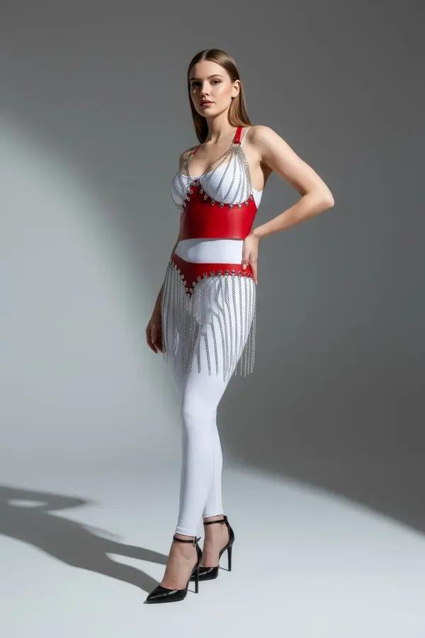 Red faux leather harness with cascading silver chain fringe skirt, structured bust panel and wide waist band, front view