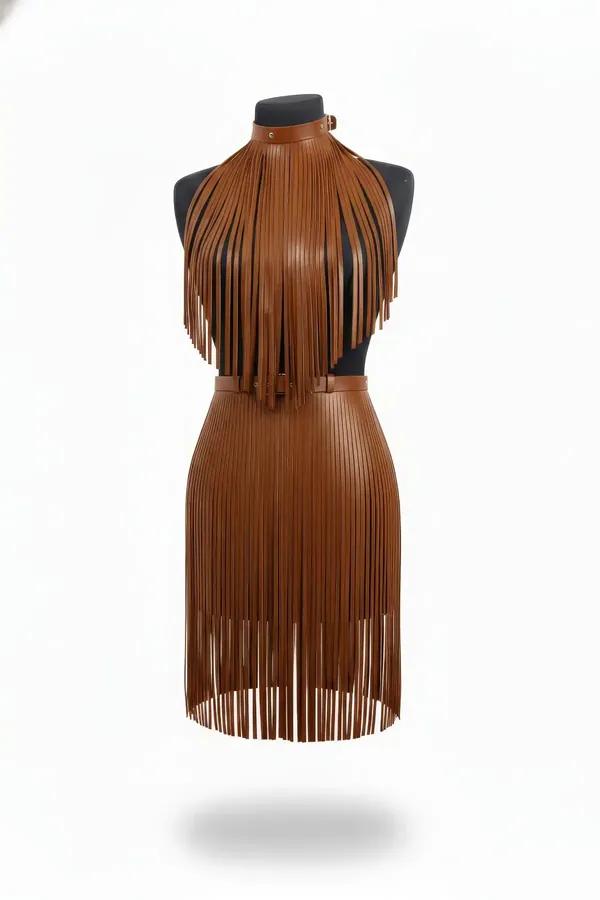 Brown faux leather fringe harness top and midi skirt set with gold buckle hardware on mannequin, cognac color, full fringe co