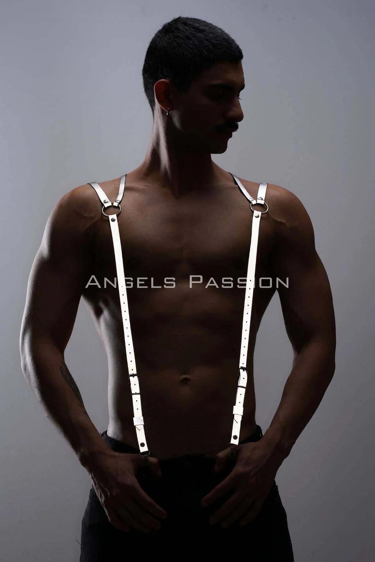 white men's shoulder harness with suspender clips attached to black trouser waistband