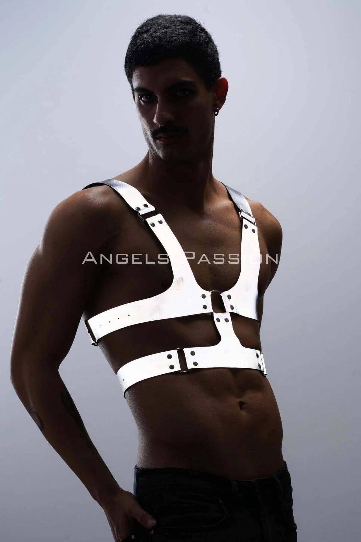 White chest harness with adjustable buckles worn over bare torso festival styling angle